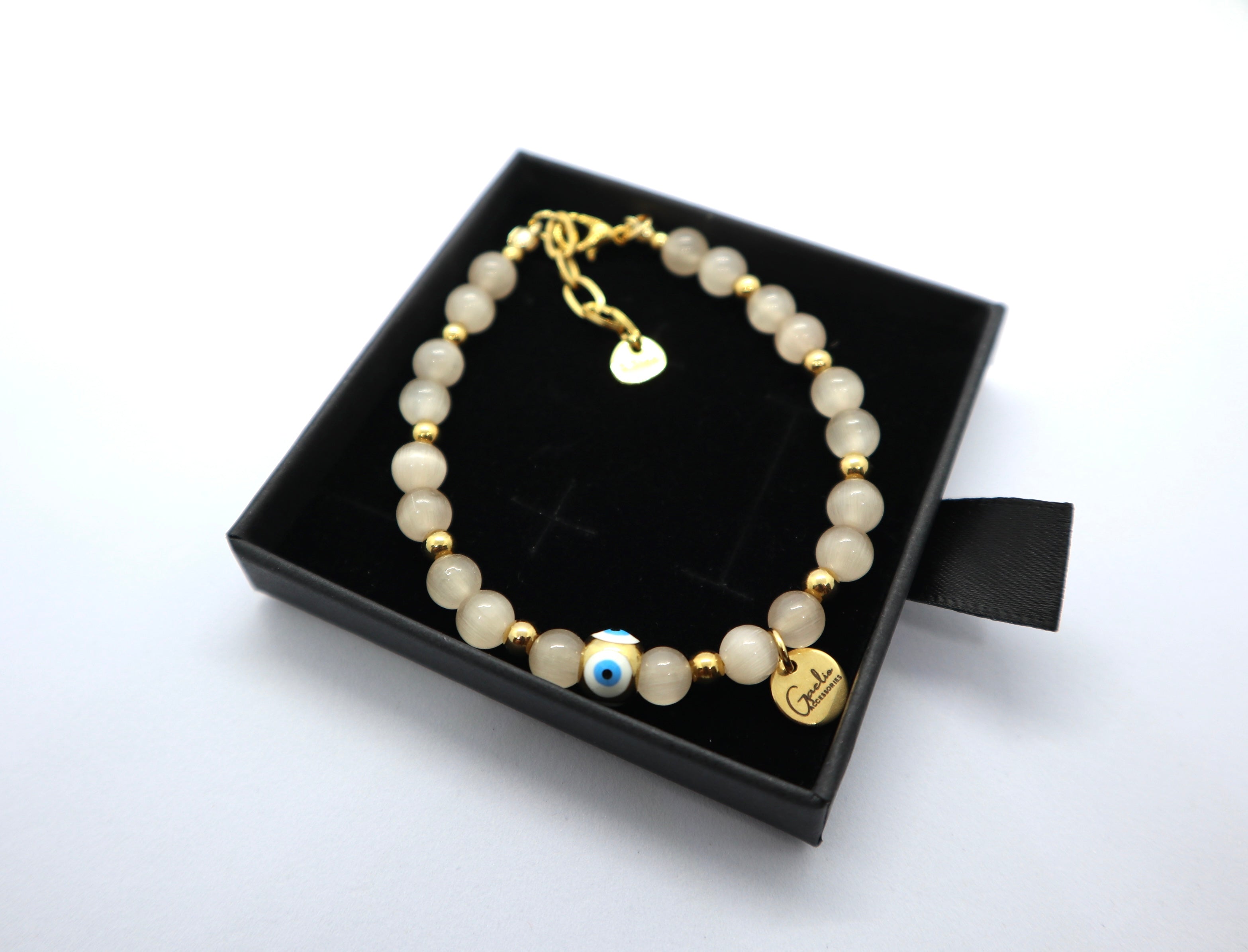 Champagne Cat Eye Bracelet with Evil Eye Charm